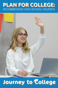 Student with their hand raised. 