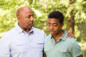 Father and son having a serious conversation.